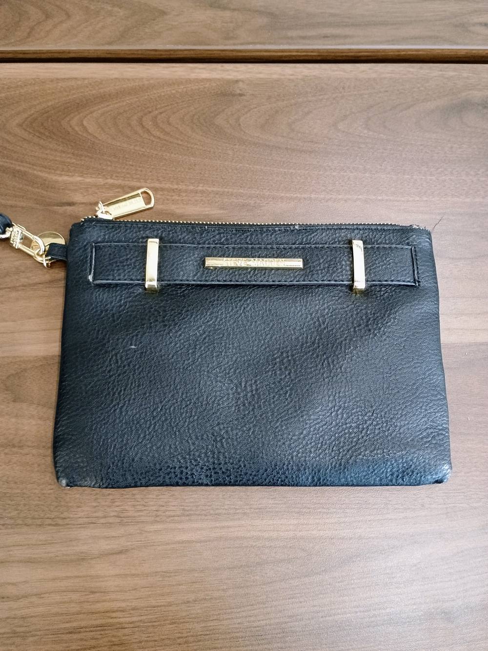 Steve Madden Black Faux Leather Wristlet with Gold Logo Bar